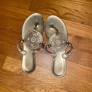 Jack Rogers gold jelly sandals.